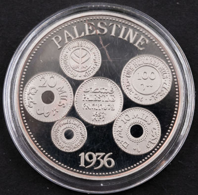 מטבע פנטזיה הנושא בגבו את דמות מטבעות המנדט והכיתוב PALESTINE 1936. בחזית: המלך ג'ורג' החמישי. 