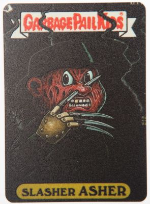 חבורת הזבל - פריט פיקנטי ויוצא דופן: קלף זהב עשוי מתכת של חבורת הזבל, מהדורה אמריקאית (סדרה 15) 