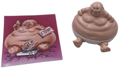 חבורת הזבל - בובת גומי מיניאטורית של דמות חבורת הזבל, אסי בולפסי, כוללת קלף רשמי של חברת TOPPS. 