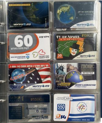 אוסף ענק של 224 כרטיסים של חברת בזק בינלאומי מסודרים באלבום. רבים מאוד חדשים שלא היו בשימוש. 