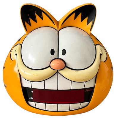 גארפילד - שעון דיגיטלי החתול גארפילד תוצרת Sunbeam, שנת 1993. שעון דיגיטלי מדבר בדמותו של החתול 