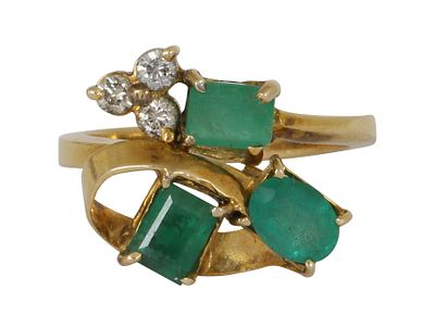 A 14K GOLD RING. Set with 3 emeralds and 3 small diamonds. Size approx. 6 US. This ring can be 