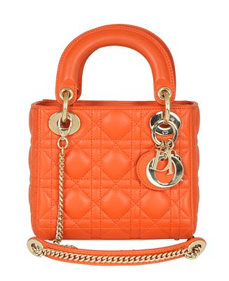 CHRISTIAN DIOR MINI LADY DIOR SHOULDER BAG. Orange color quilted leather. Gilt hardware. 