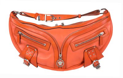 VERSACE A VINTAGE SHOULDER BAG. Halfmoon model. Orange leather. Silver-tone hardware. 