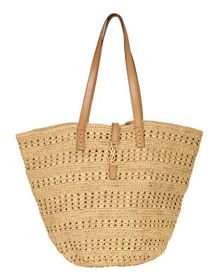 YSL OVERSIZED SHOULDER BAG. Made of straw. Leather carrying straps. 
Gilt metal ornaments. 