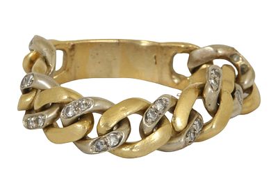 18K GOLD FLEXIBLE RING. Set with small diamonds (3 are missing). Size US 8. Weight approx. 4.7 grams.