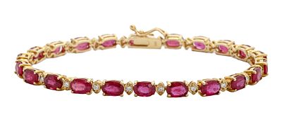 14K GOLD BRACELET. Tennis style. Set with ruby stones with a total weight of approx. 10.00 cts. 