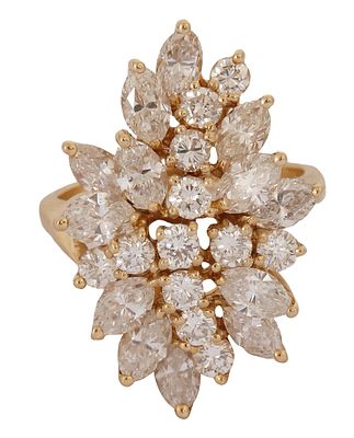 14K GOLD RING. Set with round diamonds and marquise-cut diamonds with a total weight of approx. 