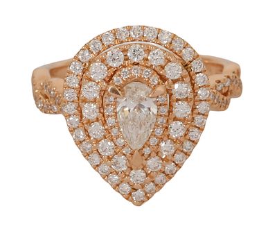 14K ROSE GOLD RING. Graduated frame in a drop design set with diamonds with a total weight of 