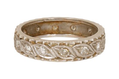 14K WHITE GOLD ETERNITY RING. Set and set with diamonds. Size approx. 8.75 US. Weight approx. 