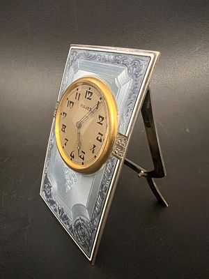 Antique and rare Swiss table / Travel clock, made of silver and enamel using the Trompe-l'œil 