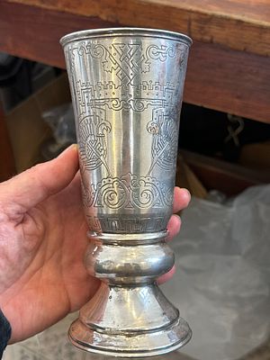 A huge Russian silver goblet from the late 19th century with magnificent handmade engravings of 