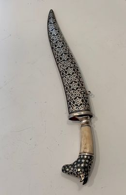 Exceptional antique Persian-style shabriya knife featuring intricate niello work and renowned 