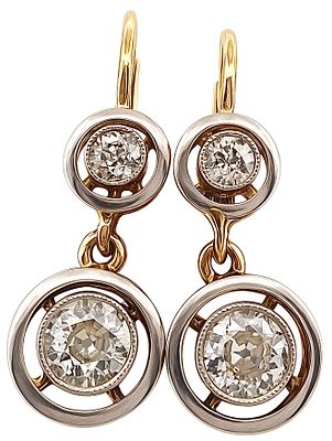 Antique earrings from the early 1900s in 18kt gold with 1.90 ct old mine diamonds. Authentic 