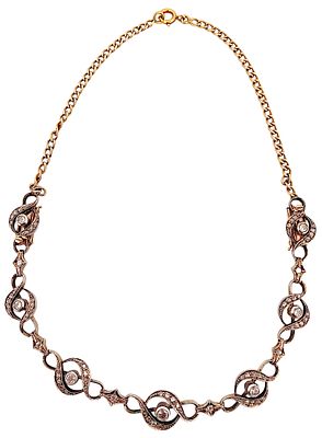 Antique necklace from the early 1900s in 18kt gold and silver with 2.10 ct diamonds. Antique 
