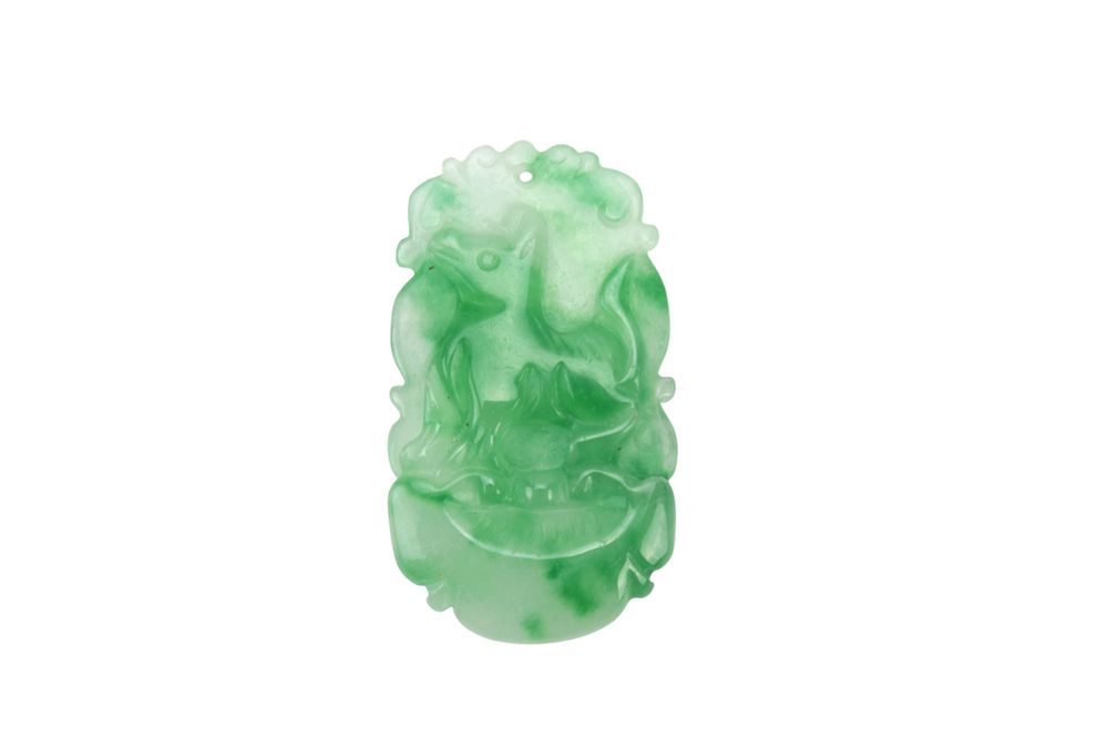 Lot 199: Carved Green Jadeite Pendant
