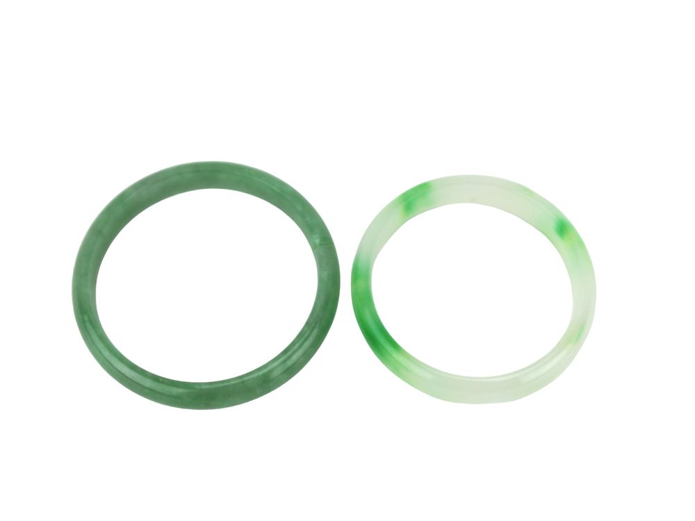Lot 214: Two Green Jadeite Bangle Bracelets