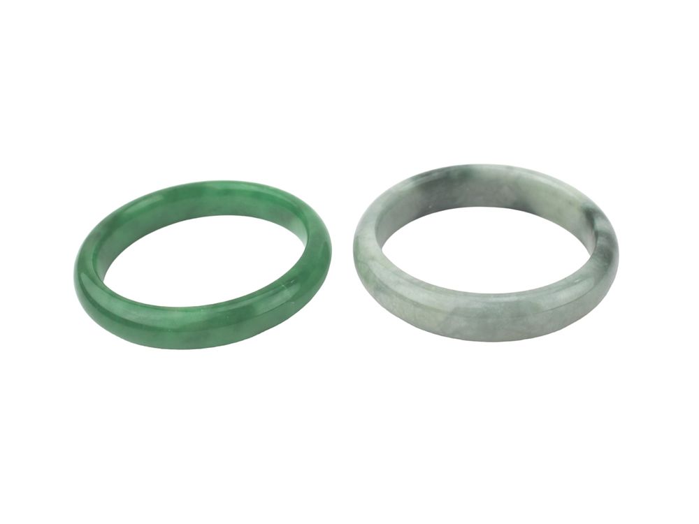 Lot 215: Two Green Jadeite Bangle Bracelets