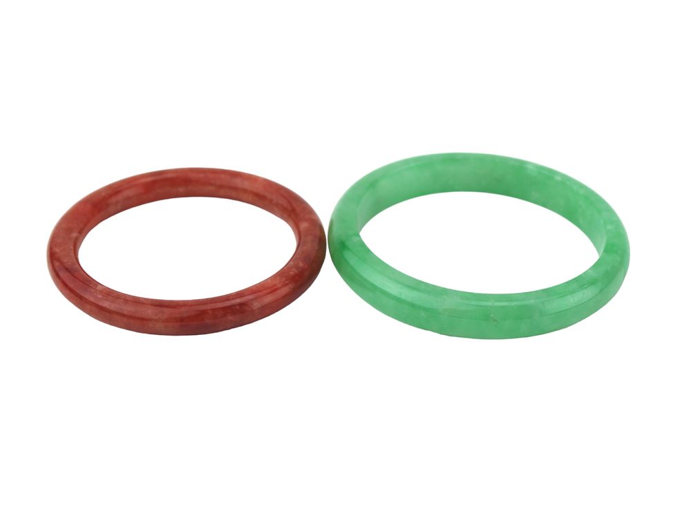 Lot 217: TWO JADEITE BANGLE BRACELETS