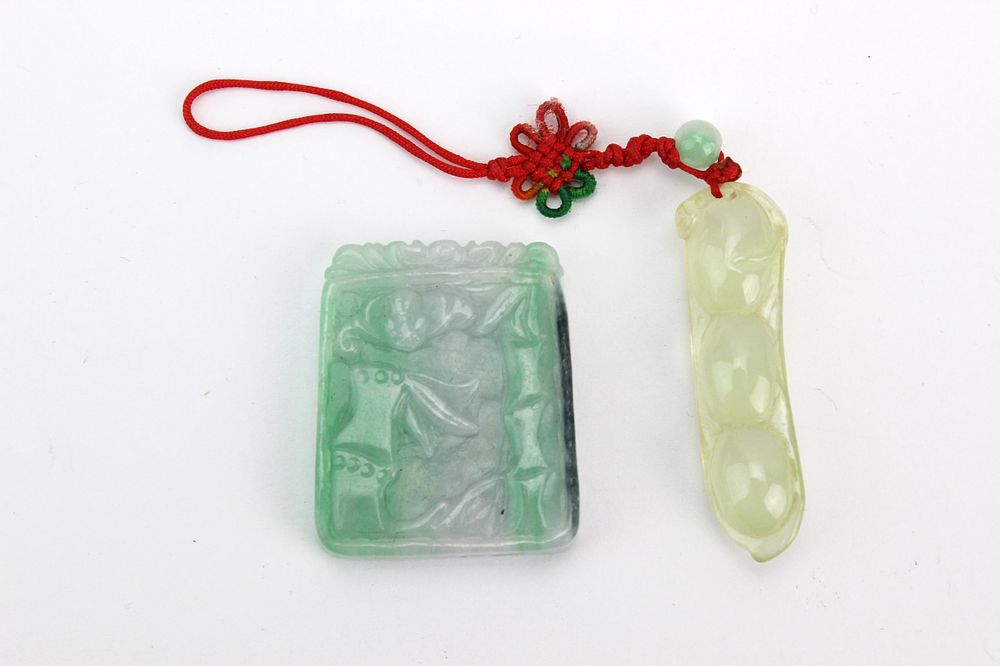 Lot 225: Two Carved Jadeite Pendants