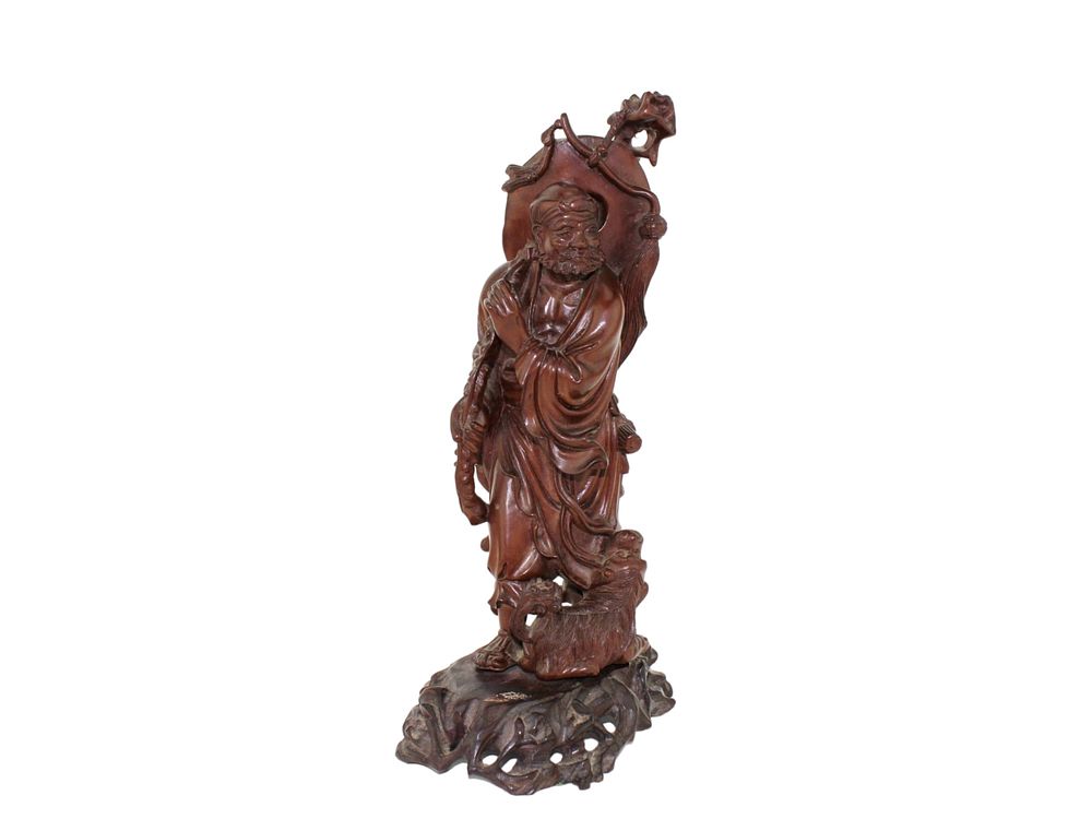 Lot 239: Chinese Carved Boxwood Immortal Figure