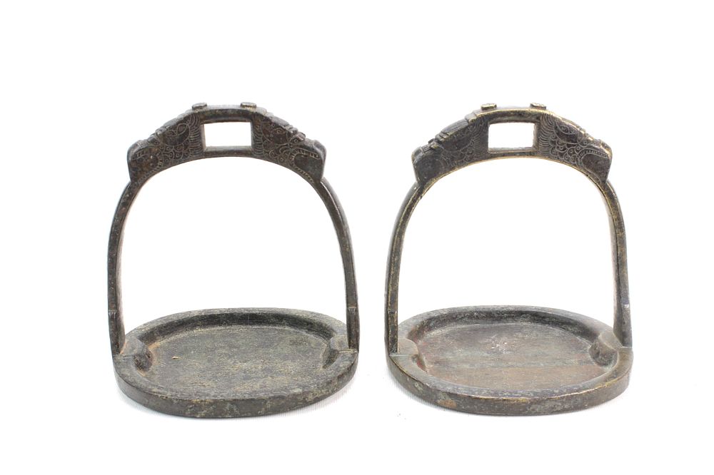 Lot 268: Pair of Chinese Bronze Stirrups with Design