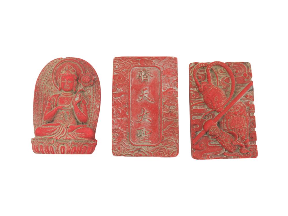 Lot 328: Trio of Red Lacquer Carved Pendants