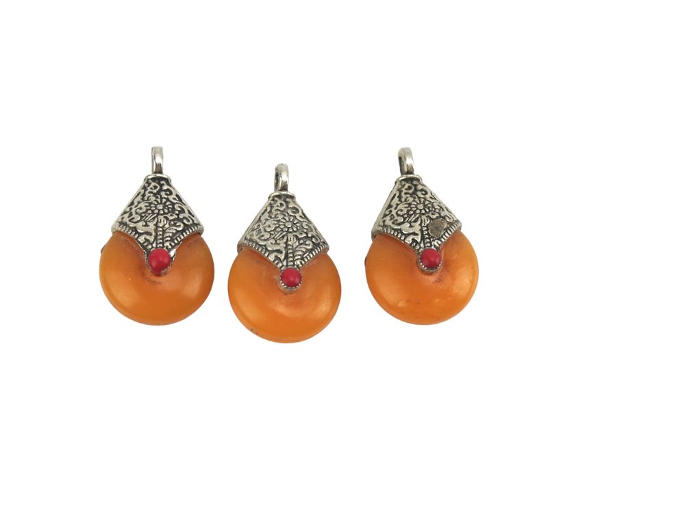 Lot 333: Set of Three Amber-Style Drop Pendants