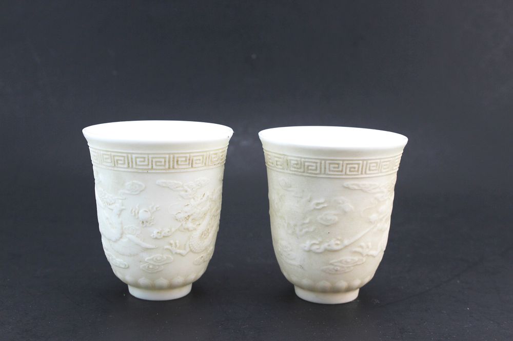 Lot 376: Two Chinese White Porcelain Relief Cups