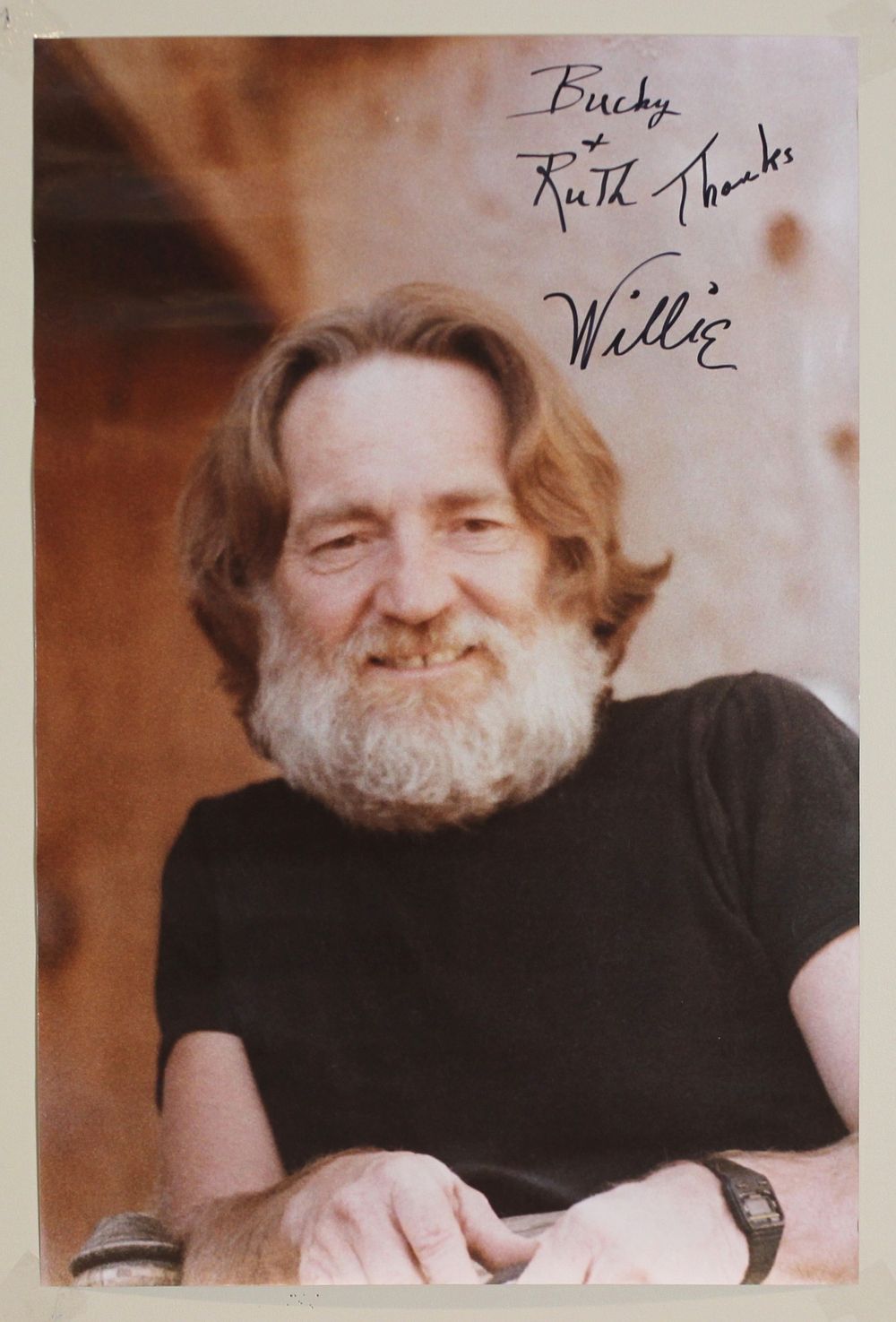 Lot 428: Signed Willie Nelson Portrait Photograph