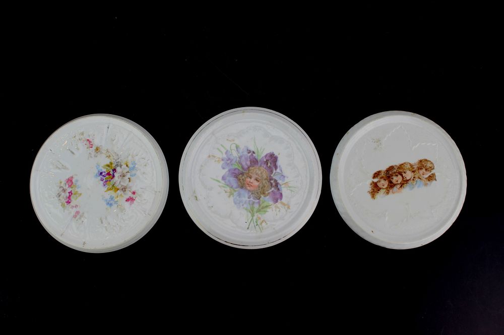Lot 540: Three Ceramic Trivets w/ Floral & Portrait Motifs