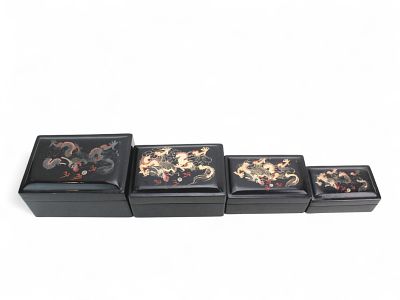 Set of Four Chinese Lacquer Dragon Boxes. Set of four Chinese black lacquer nested boxes 