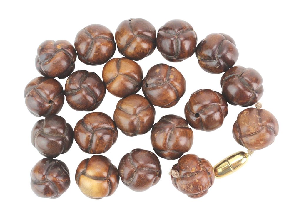 Lot 152: Lot of 20 Carved Wood Beads