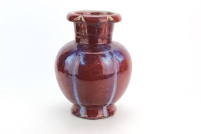 Chinese Flambe Glazed Porcelain Vase. Chinese porcelain vase of rounded baluster form with a 