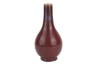 Chinese Oxblood Glazed Porcelain Vase. Chinese porcelain vase of pear-shaped form with a deep 