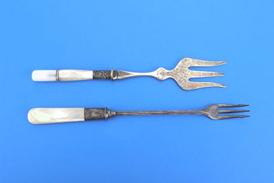 Silver Plate Forks w/ MOP Handles. Pair of silver plate serving forks with mother-of-pearl 