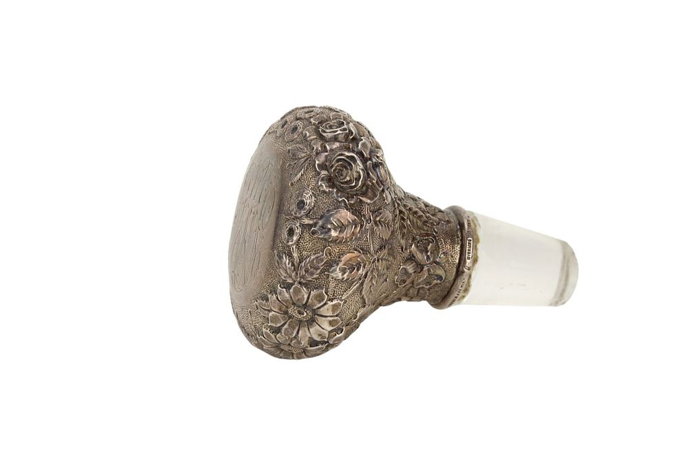 Lot 452: Sterling Silver Floral Glass Stopper