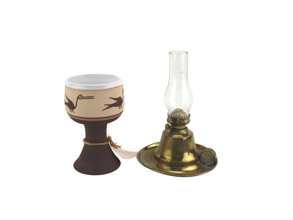 Lot 527: A Ceramic Goblet and Miniature Brass Oil Lamp