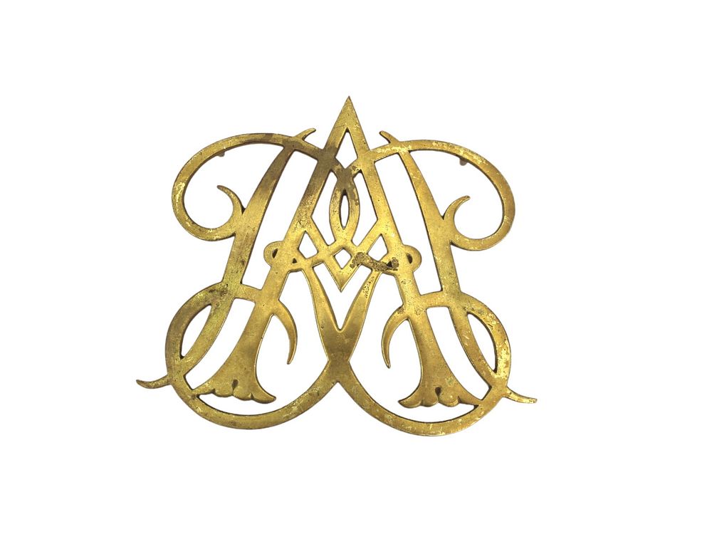 Lot 530: Queen Ann Cypher Brass Trivet