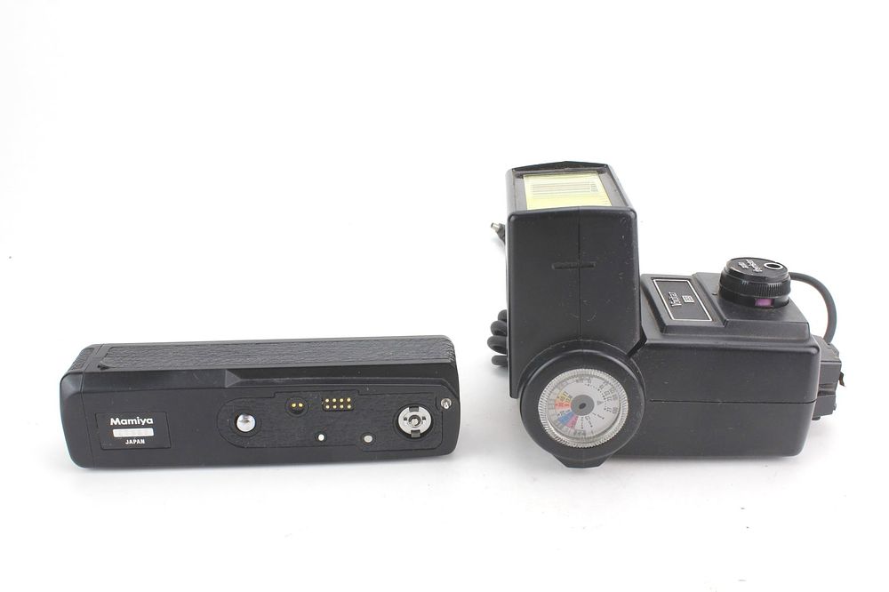 Lot 630: Mamiya Camera Battery Grip & Vivitar Flash