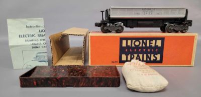 Postwar Lionel O gauge 3459 automatic dumping ore car with aluminum/silver painted bin in 