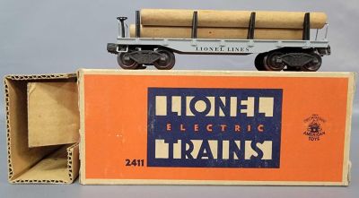 Postwar Lionel O gauge 2411 flat car with logs in original box with insert, C7. Box has light 
