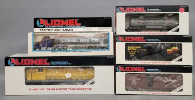 Five Lionel O gauge pieces with RS-3 Diesel and cars in original boxes. Includes 18805 Union 