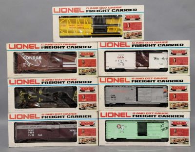 Seven Lionel O gauge mixed box cars in original boxes. Includes 9400 Conrail box car, 9401 