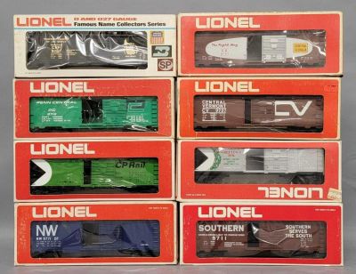 Eight Lionel O gauge mixed box cars in original boxes. Includes 9711 Southern box car, 9713 