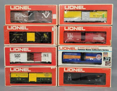Eight Lionel O gauge mixed box cars in original boxes. Includes 9702 Soo box car, 9710 Rutland 