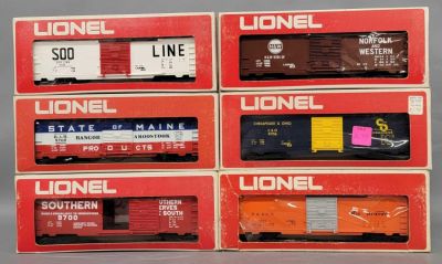 Six Lionel O gauge mixed box cars in original boxes. Includes 9700 Southern box car (blank box) 