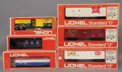 Six Lionel O gauge mixed box cars in original boxes. Group of six Lionel O gauge mixed box cars 