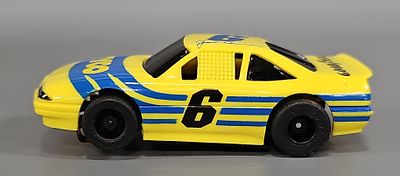 Scarce Tyco Joel Tazman Magnum 440-X2 #6 Chevy Lumina Slot Car. The car is in near mint 