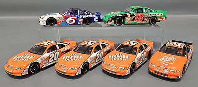 Four Different Scalextric 1/32 Slot Cars to include Tony Stewart #20 Home Depot Pontiac Grand 